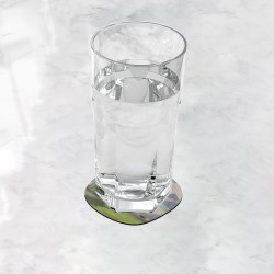 زیر لیوانی طرح سه گاو در حال چرا از مونه