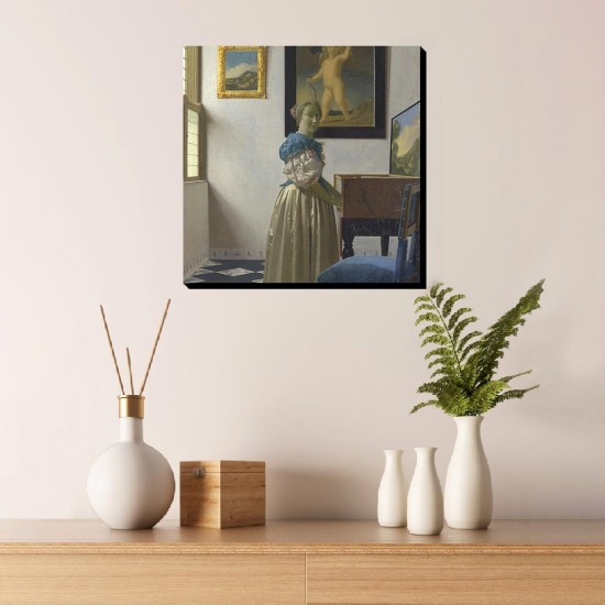 تابلو شاسی طرح زن ایستاده پشت ساز ویرژینال از ورمر